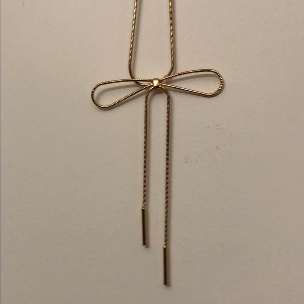 Gold bow necklace